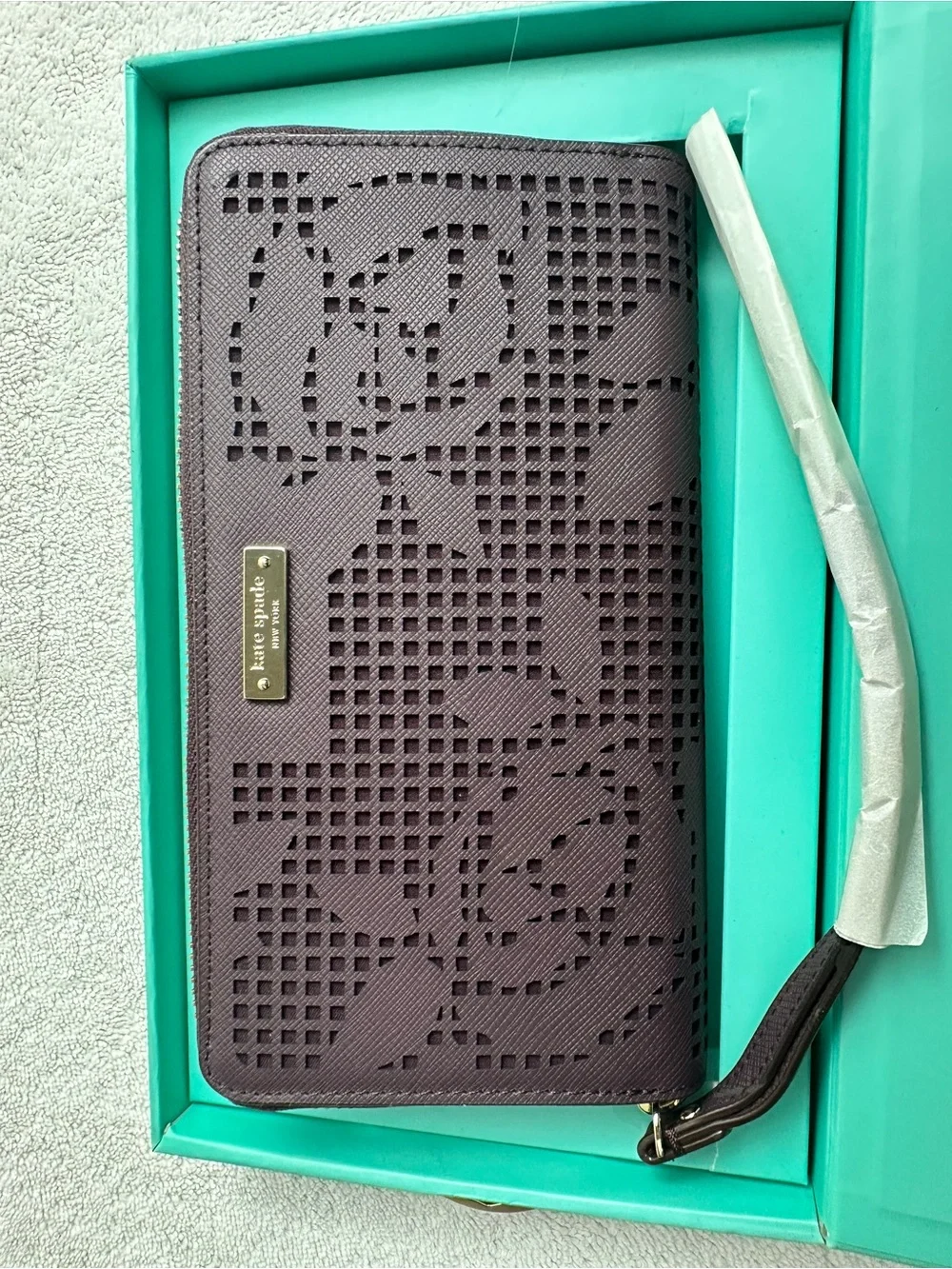 kate spade plum perforated floral zip phone wristlet